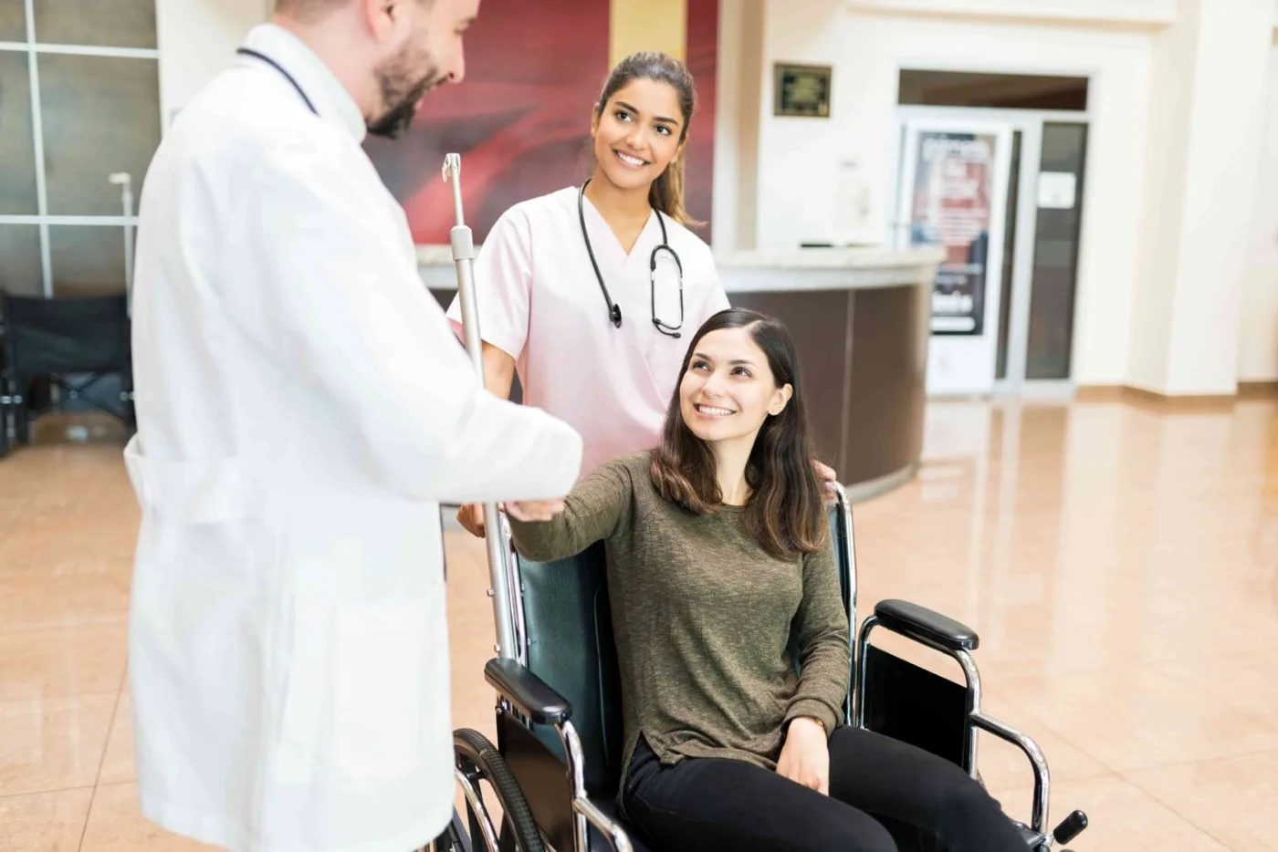 Recovered patient saying goodbye to her medical team