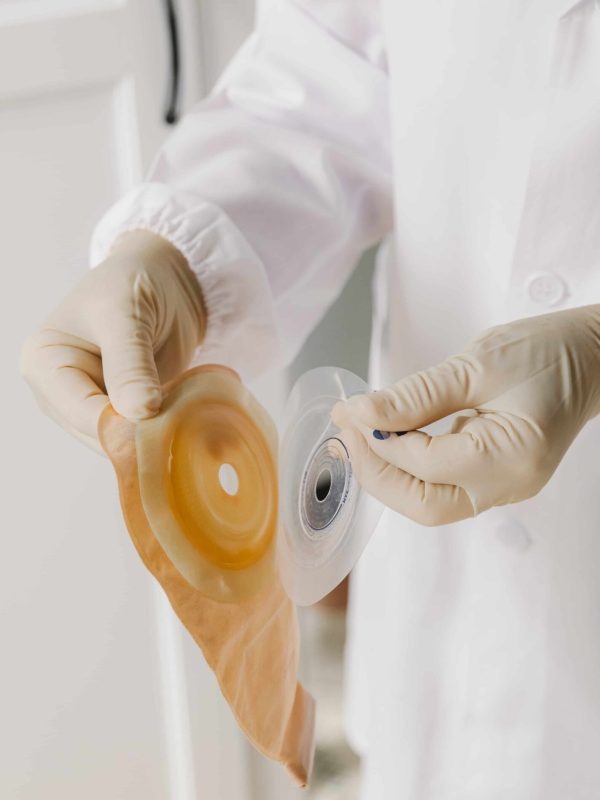 a-nurse-prepares-a-colostomy-bag-to-replace-for-a-2025-06-16-17-57-15-utc-min-1423x2048