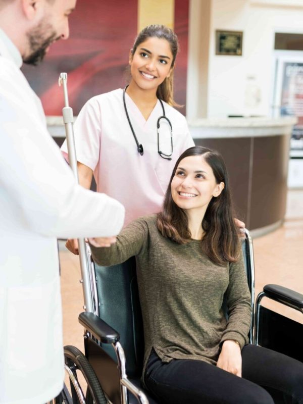 recovered-female-greeting-goodbye-to-medical-exper-2025-05-06-23-08-00-utc-min-1536x1025